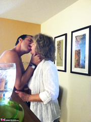 Sexually Excited granny BustyBliss oils up floppy breasts & widens love tunnel for hotel lad toy