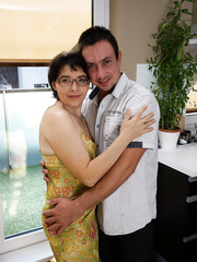 Aged granny giving a kiss and petting her toy guy and fucking in the kitchen