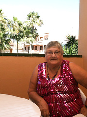 Corpulent grandmother GrandmaLibby parts her labia lips after disrobing on balcony