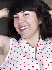 Plump dark brown legal age teenager shows off her bush after stripping nude