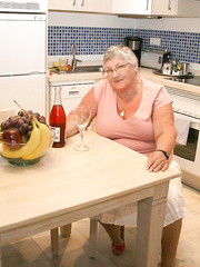 Older big beautiful woman Grandma Libby undresses in the kitchen to wine & dine & toy muff in nature's garb