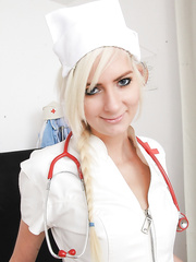 Simone has her fresh nurse uniform so that babe shows her fur pie close up