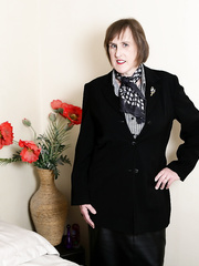 British nan licks a nipps as that babe disrobes to satin underware and mesh nylons