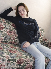 Nerdy legal age teenager plays with her naturally unshaved muff after undressing