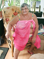 Concupiscent old granny in glasses undresses to disclose giant saggy melons & large big beautiful woman butt