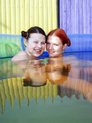 Barely legal beauties Britt E and Anita E play with their cookies underwater