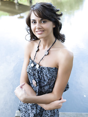 Cute tee Astrud A on dock widening to display shaggy cunt in stripped feet