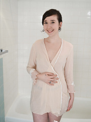 Dark Brown dilettante bares her large gazoo as that babe receives willing for a bathroom