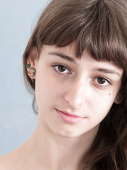 Thin legal age teenager cutie strips to put her unshaven body on display