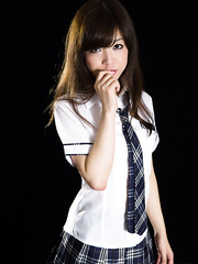 Japanese schoolgirl flashes a no panty upskirt in advance of jerking off a penis