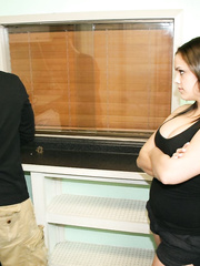 Large titted Katie Cummings shows her stud who's boss a kitchen tugjob
