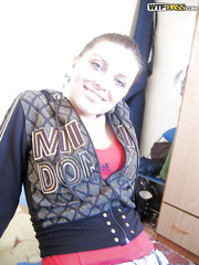 Lusty non-professional with giant billibongs stripping and widening her legs