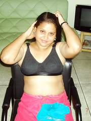 Obese Indian woman uncovers her natural zeppelins as that babe receives absolutely bare