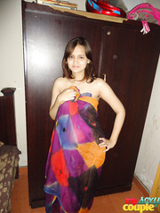 Preggo Indian woman lets a teat slide after showing her stomach bump