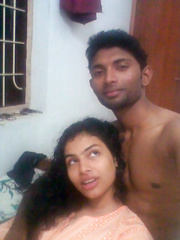 Indian wife listens to music whilst setting her natural bra buddies free