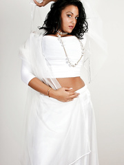 Thick Indian model Keira sets her great bazookas free in lace underclothing