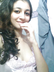 Indian solo angel holds her face firm during the time that letting teats free of underware