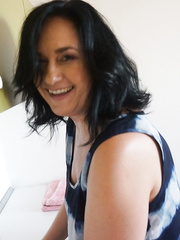Aged housewife Ria Darksome undresses after washing up dishes to finger her twat