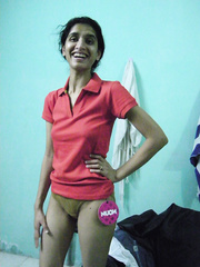 Tall Indian housewife shows her full bush during the time that modelling completely bare