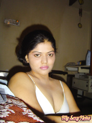 Indian female Neha uncovers large naturals and big areolas during self shots