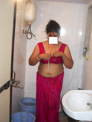 Breasty Indian woman joins her  ally for foreplay on couch