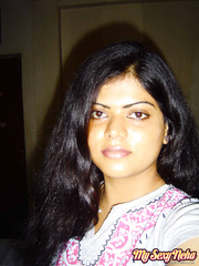 Indian woman Neha takes self shots during the time that this babe holds her face firm