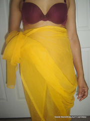 Bulky Indian female frees her hairless twat and gazoo from a wrap