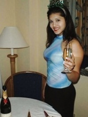 Cute party gal Sunny Leone rings in the fresh year widen in nature's garb on a table