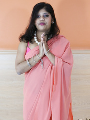 Obese Indian female Rupali Bhabhi cups her scoops as that babe receives bare