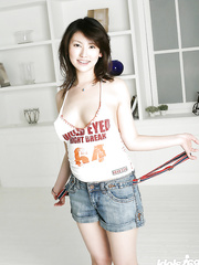 Breasty oriental playgirl with hot arse Takako Kitahara stripping off her raiment