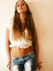 Sassy legal age teenager cutie Tayra A undresses off ripped jeans on way to modeling in the in nature's garb