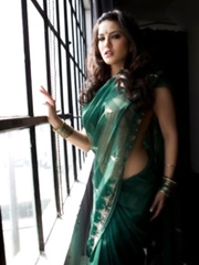 Breathtaking erotic Sunny Leone in sheds sheer sari revealing her ideal body