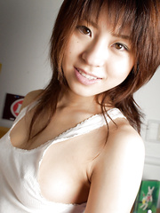 Glamorous oriental legal age teenager Haruka Tsukino slipping off her pants on the ottoman