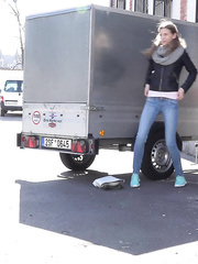 Sarah Key can't hold her pee any longer and piddles behind a trailer