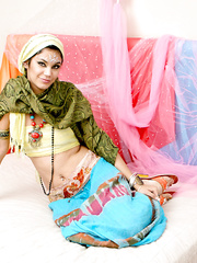 Fully dressed Indian female Yesica uncovering her forbidden face