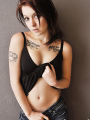 Tattooed legal age teenager Scarlett uncovers pert pointer sisters in advance of slipping jeans over undressed butt