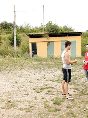 Juvenile brunette hair acquires team-fucked by her boyfriend on yoga mat in field