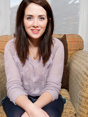 Sexy brunette hair Elizabeth James doffs her silk brassiere to pose her large titties topless