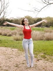 Natural redhead Ruby Corbett undresses to her brassiere and pants at home