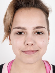 Dilettante model Michaela undresses off coveralls and underware to pose stripped