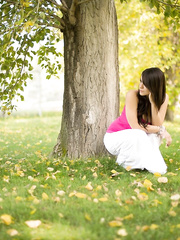 Brunette Hair non-professional Bryci fingers her sexually excited slit beneath a tree