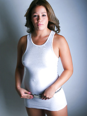 Solo model with a beautiful face models non stripped in a constricted suit