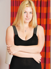 Breasty golden-haired solo gal stretches her hairless snatch wide open during the time that masturbating