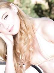 Non-Professional model Hannah Hays lets her teenie boobs escape her bikini top