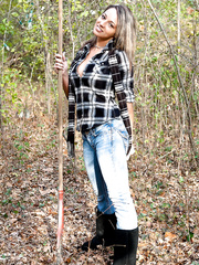 Solo cutie Nikki Sims disrobes to a lengthy scarf and her boots out in the woods