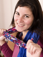 Cute latin chick Amber receives undressed on the bed to show her natural shaggy slit