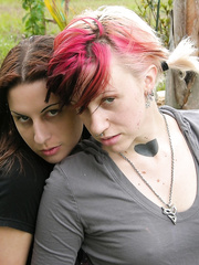 Non-Professional dykes in blue jeans simultaneously undress undressed in a bedroom