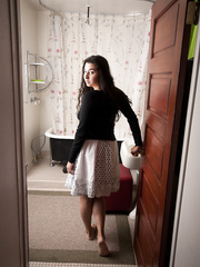 Black haired babe uncovers her natural bush as this babe readies for a bathroom