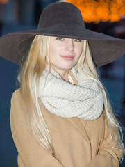 Dressed blond honey unveiling hawt legal age teenager wazoo and bald snatch during the time that stripping