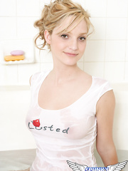 Valuable legal age teenager angel shows off her strap adorned booty in a moist T-shirt